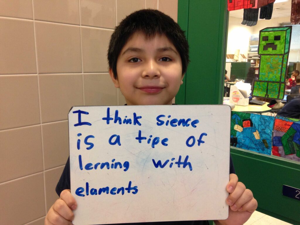 A fifth-grader from Stratton defines science as "a type of learning with elements." The student is referencing a states of matter science unit that introduces the concept of atomic elements.
