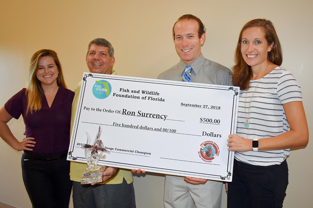 Lionfish Outreach Team with Commercial Champion Ron Surrency. Left to right: Kali Spurgin, Ron Surrency, Mike Kennison, Hannah Tillotson.