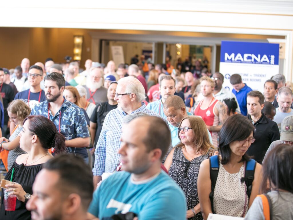 Hundreds gathered to await the opening of the MACNA 2018 exhibit floor on Friday morning to the general public.