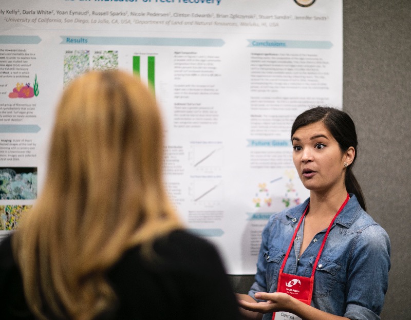 Christina Jayne, discussing her research at the MACNA 2018 Scientific Poster Session.
