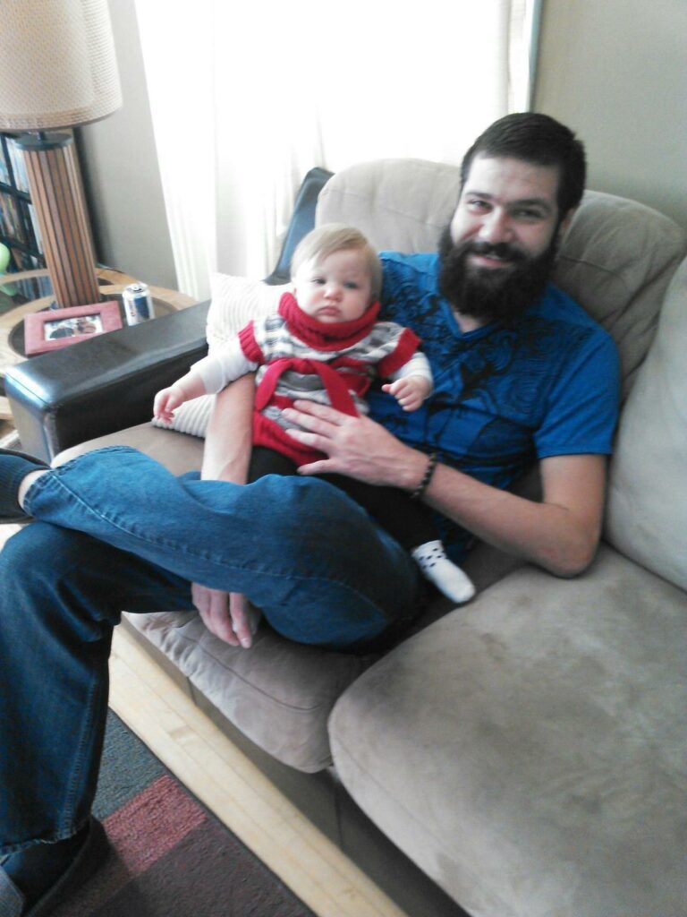 Jake Adams meeting my 10-month-old daughter, AJ, during a trip to Duluth, MN, in January 2014. 