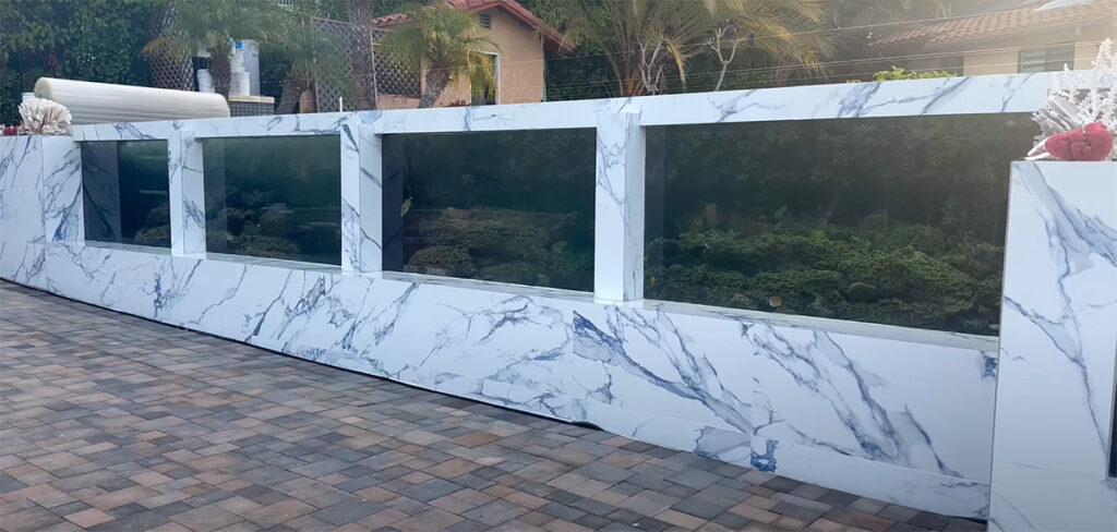 Coming in at 40 feet in length and 13,000 gallons, Steve's Backyard Ocean is a testament to DIY ingenuity in the reef aquarium hobby. Screenshot from video at the Backyard Ocean YouTube channel.